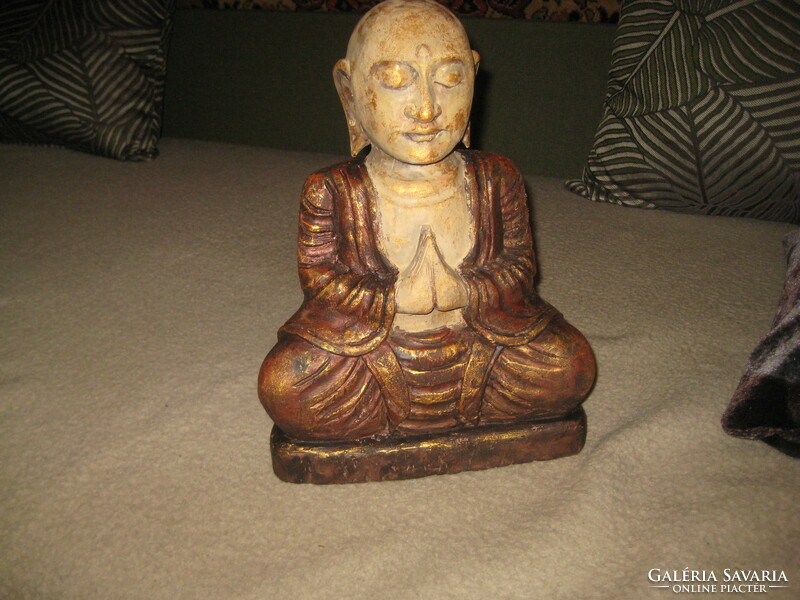 Praying Buddha, carved from wood, painted, 25 x 34 cm