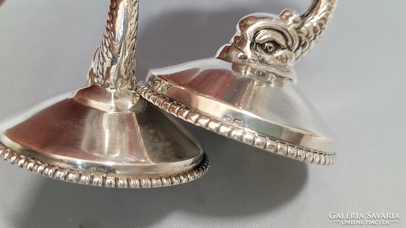 Pair of antique silver fish candle holders