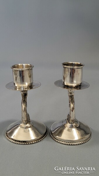 Pair of antique silver fish candle holders