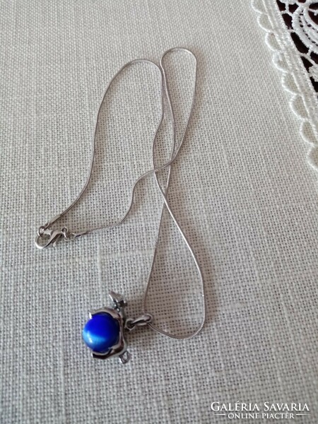 New silver plated necklace with dog pendant -- rotating blue cat's eye stone