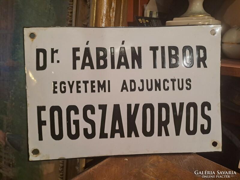 Convex enamel plate: dr. Tibor Fábián is a dentist