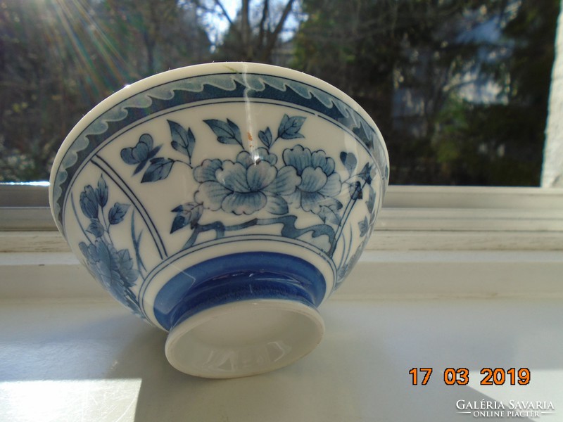 Arita Japanese blue white flower patterned rice bowl