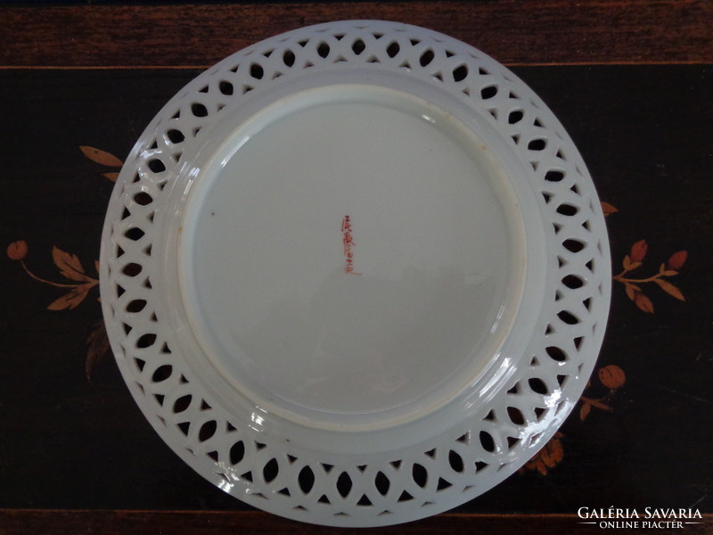 Marked Japanese openwork porcelain plate vi.