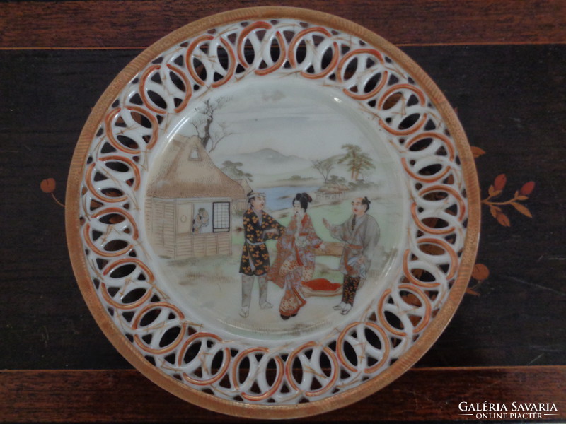 Marked Japanese openwork porcelain plate vi.