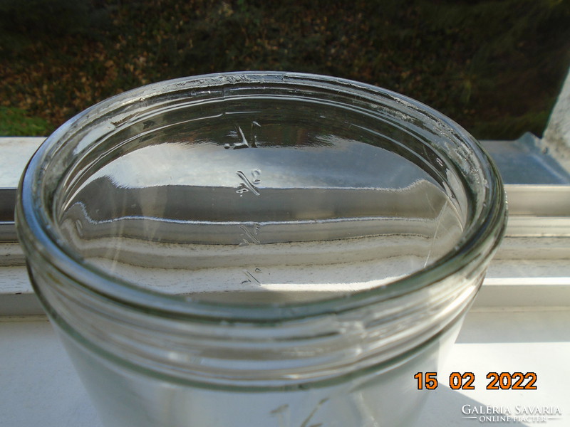 Old thick-walled 1 l mason jar with gauge