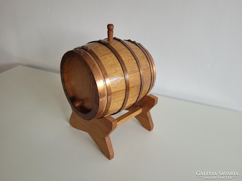 Retro old ornament on wooden wine barrel barrel stand