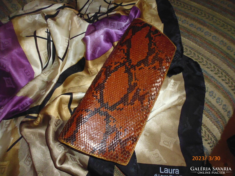 Women's vintage genuine snakeskin handbag.