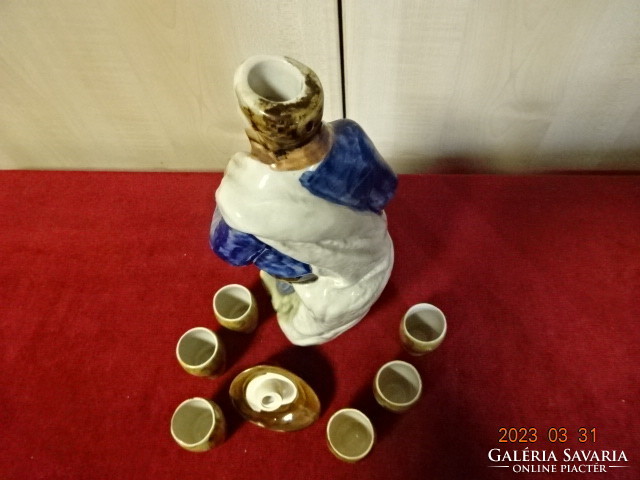 Polish glazed ceramic brandy set, hand painted. The spout is a figure with a hat. Jokai.