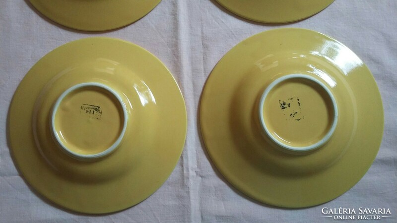 Six small yellow ceramic plates (19.5 cm)