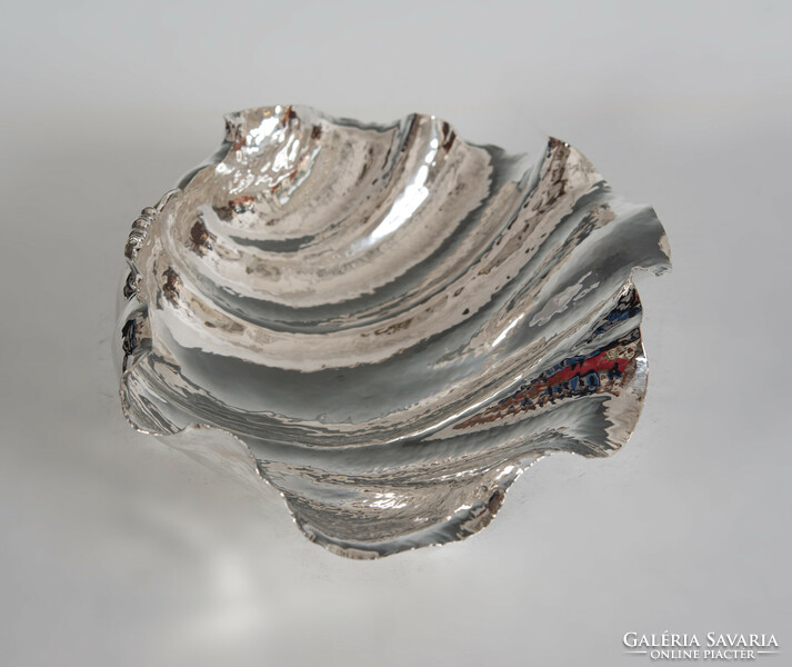 Silver shell-shaped hand-hammered bowl