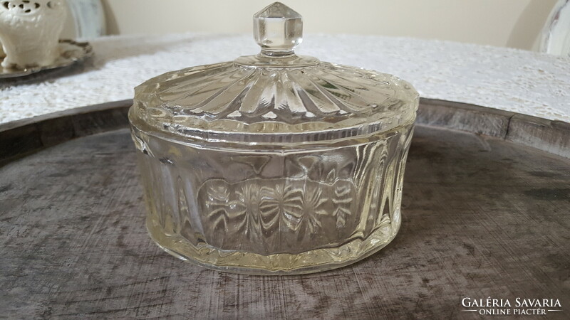 Old thick glass sugar bowl with a lid