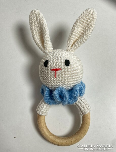 Hand crocheted bunny boy with wooden tongs