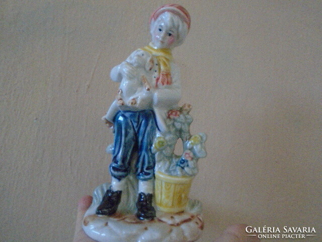 Fine German porcelain holding a dog, super demanding piece 19 x 10 cm