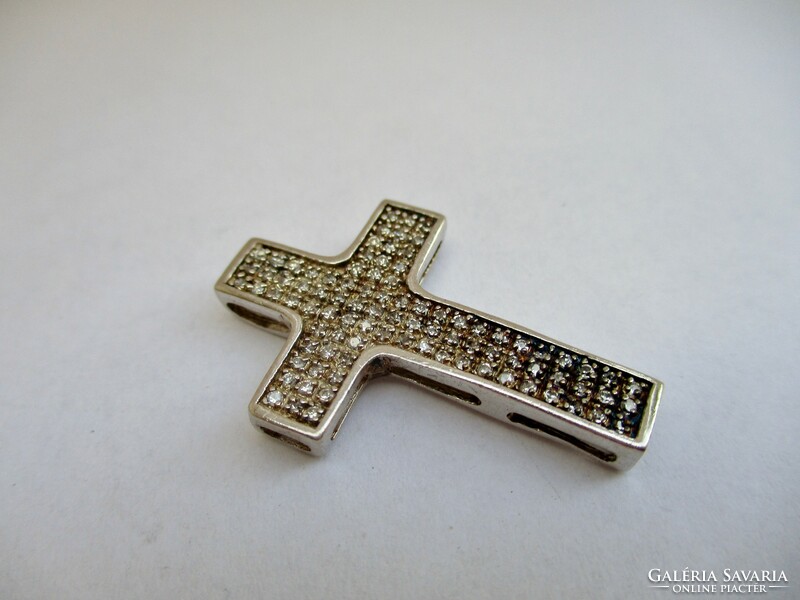 Beautiful silver cross pendant with small white stones