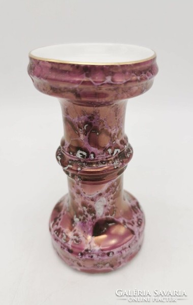A rare candle holder with a luster from Raven House