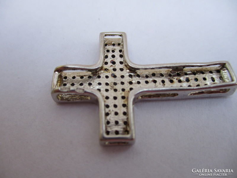 Beautiful silver cross pendant with small white stones
