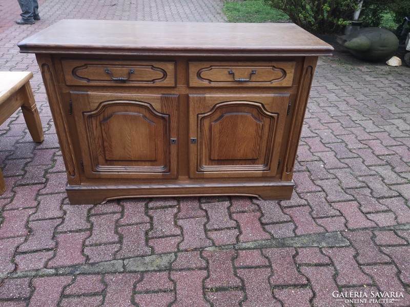 Glass cabinet with a small chest of drawers