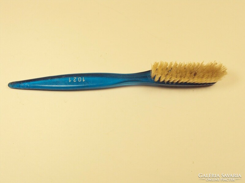 Retro blue plastic toothbrush