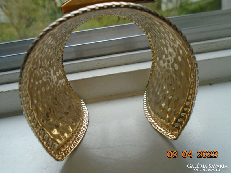 Spectacular hammered gold colored cuff bracelet with yellow faceted stone braided pattern rim