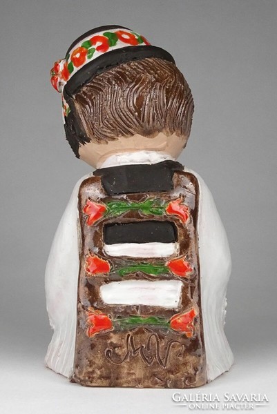 1M526 marked ceramic lad playing the flute in folk costume 19.5 Cm