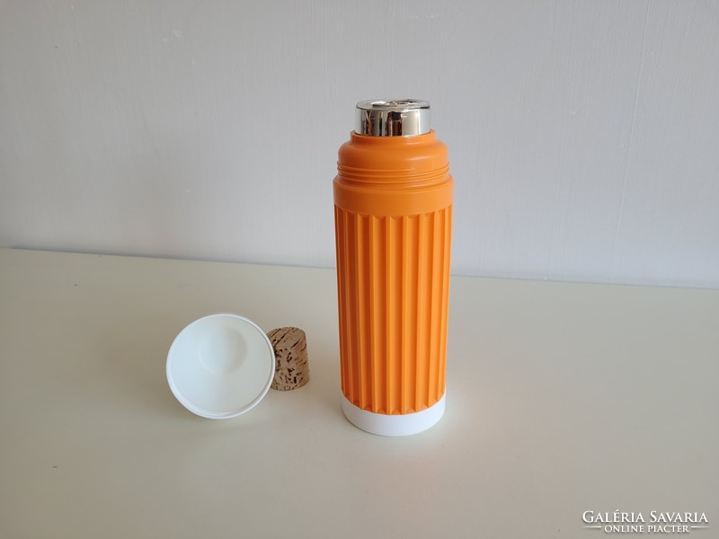 Retro orange thermos with old glass insert