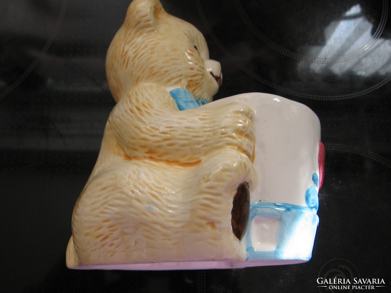 Ceramic teddy bear figurine with toothbrush and pencil holder