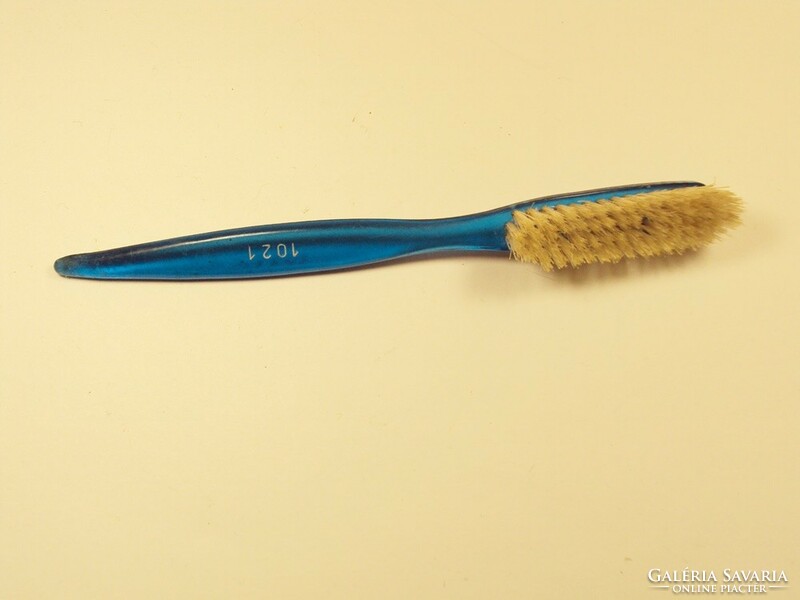 Retro blue plastic toothbrush