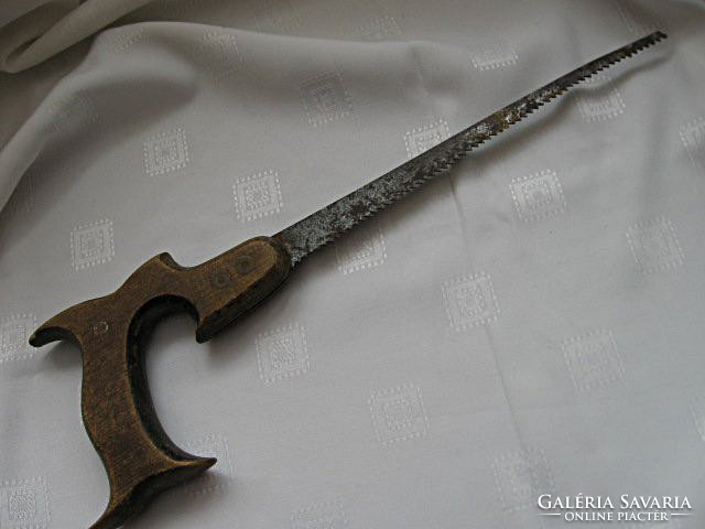 Old carved saw