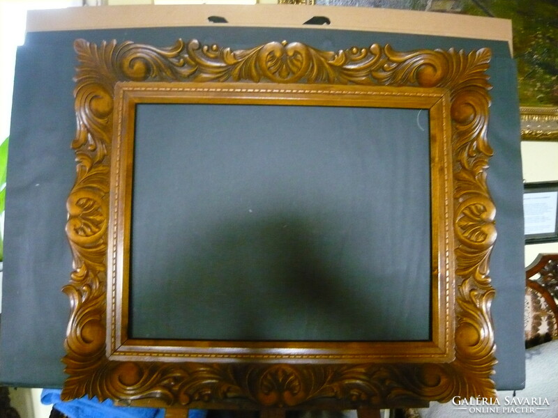 Carved frame.