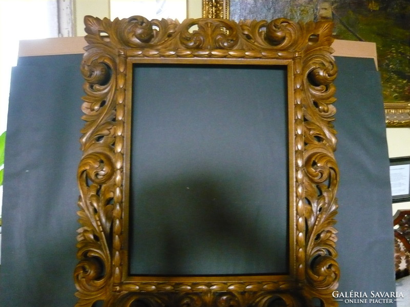 Carved frame.