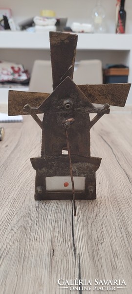 Old copper windmill thermometer.