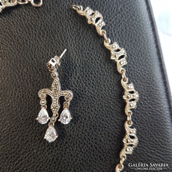 Silver antique necklaces with matching earrings. The price applies to both together.