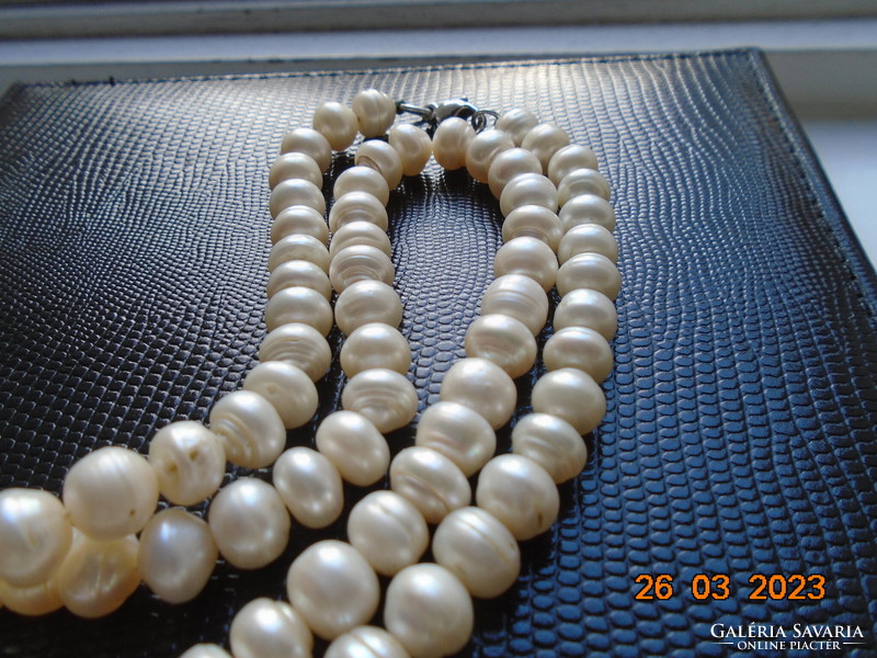 Necklace made of 93 real pearls with 925 marked silver clasp