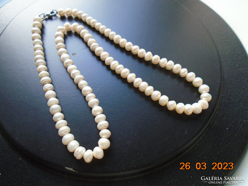 Necklace made of 93 real pearls with 925 marked silver clasp