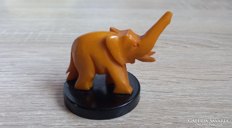 Old amber colored vinyl elephant figure
