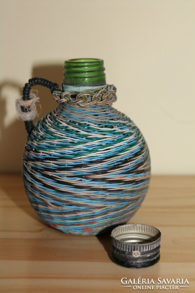 Bottle with blue and white fuse