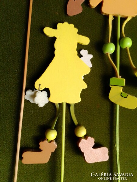 Four painted colorful wooden stick figure goose goose rabbit bunny lamb hen Easter spring decoration