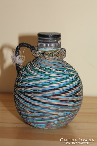 Bottle with blue and white fuse