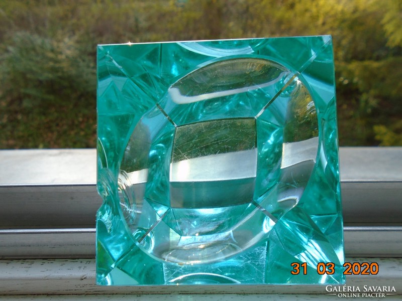 Faceted turquoise crystal decorative glass with an oval recess