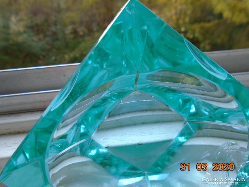 Faceted turquoise crystal decorative glass with an oval recess