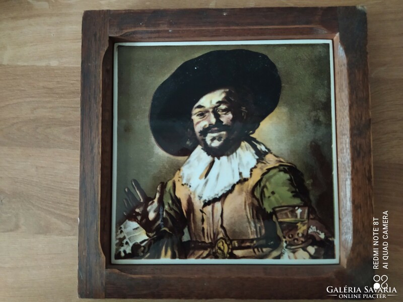 Painted tile picture in a wooden frame