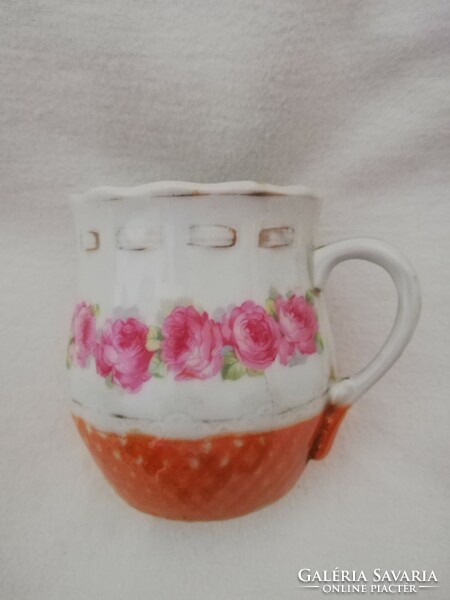 A rosy-bellied mug that is close to a hundred years old