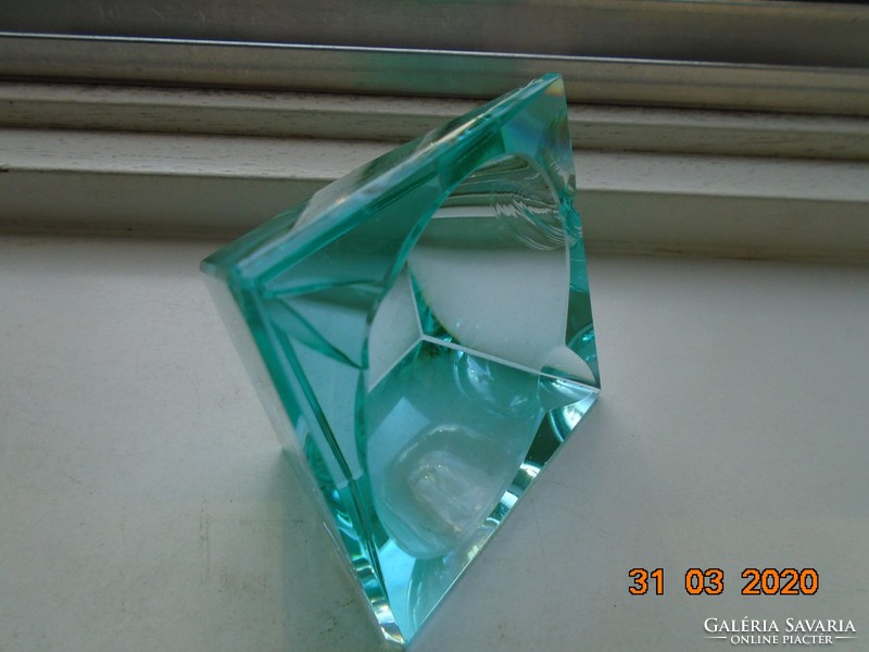 Faceted turquoise crystal decorative glass with an oval recess