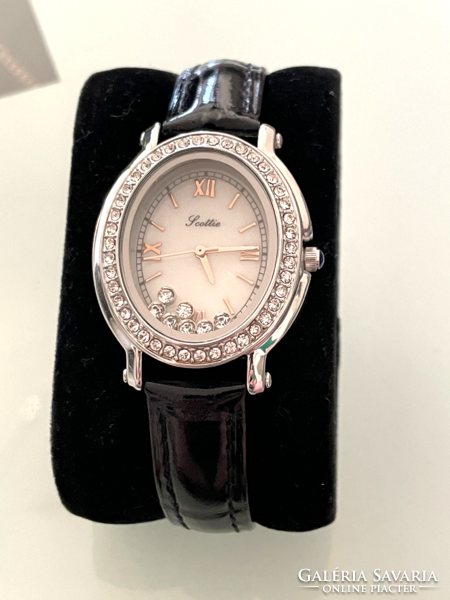 A beautiful women's jewelry watch inspired by Chopard with floating crystals