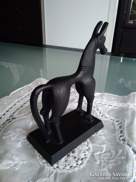 Metal black horse statue from the 80s modeled after an ancient Greek statue.