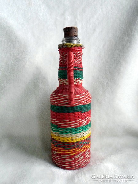 Old retro, beautiful small glass demijohn bottle woven with wire 19.5 cm