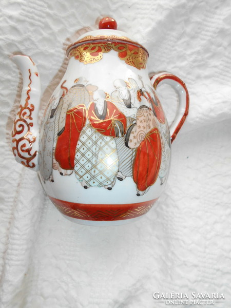 Antique hand-painted porcelain jug with a traditional oriental pattern, 15 cm