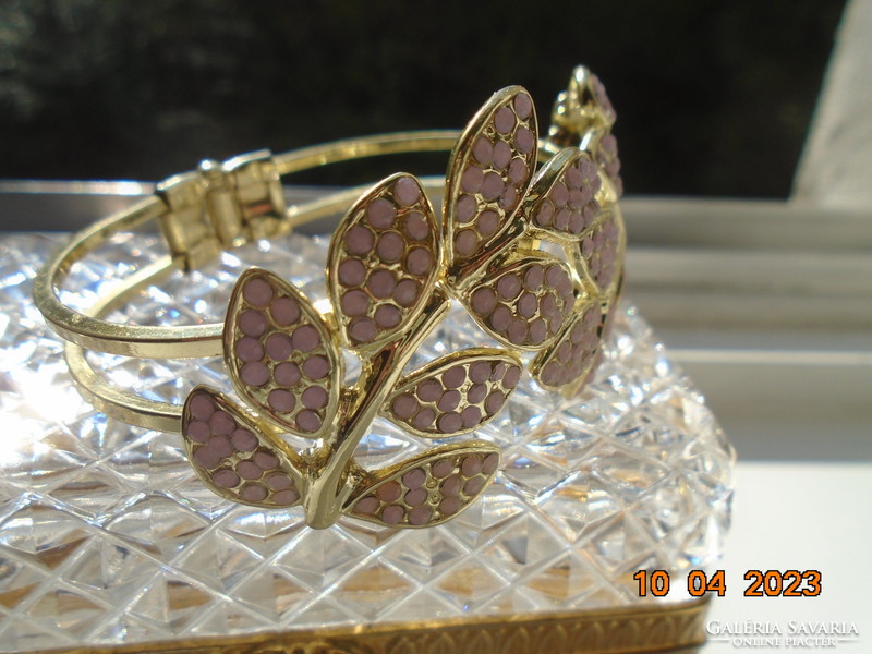 Gold-plated spring steel bracelet studded with small pink stones