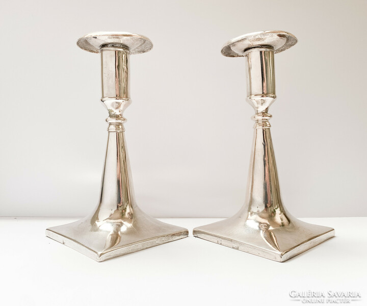 Pair of antique silver candle holders.