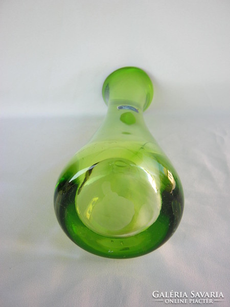 Hermann crystal in green glass vase